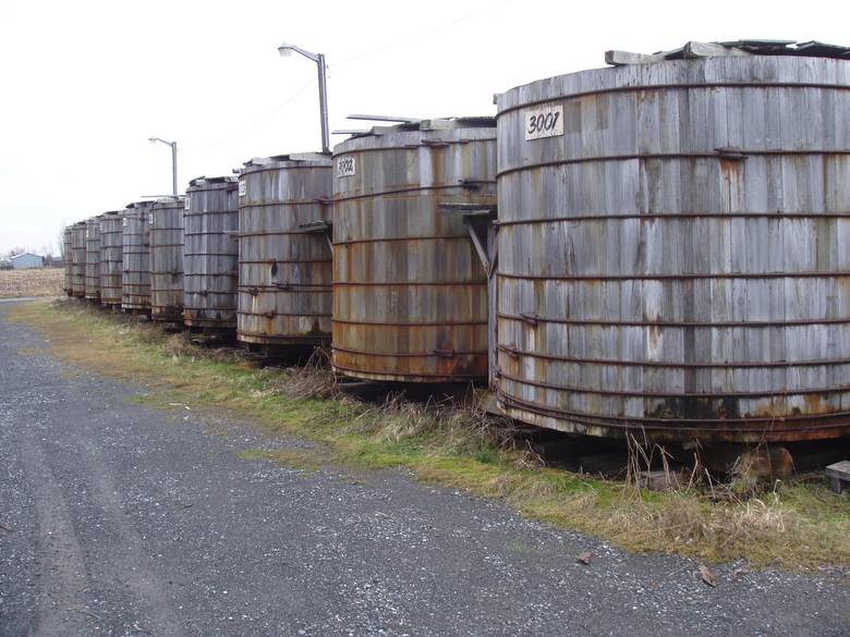 Pickle Tanks from Ground Level / These are wooden pickle vats in a pickle processing plant