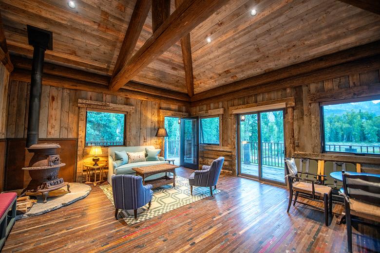 Antique Gray Board-to-Board Wall and Ceiling with Hand-Hewn Timber Accents