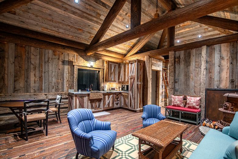 Antique Gray Board-to-Board Wall and Ceiling with Hand-Hewn Timber Accents